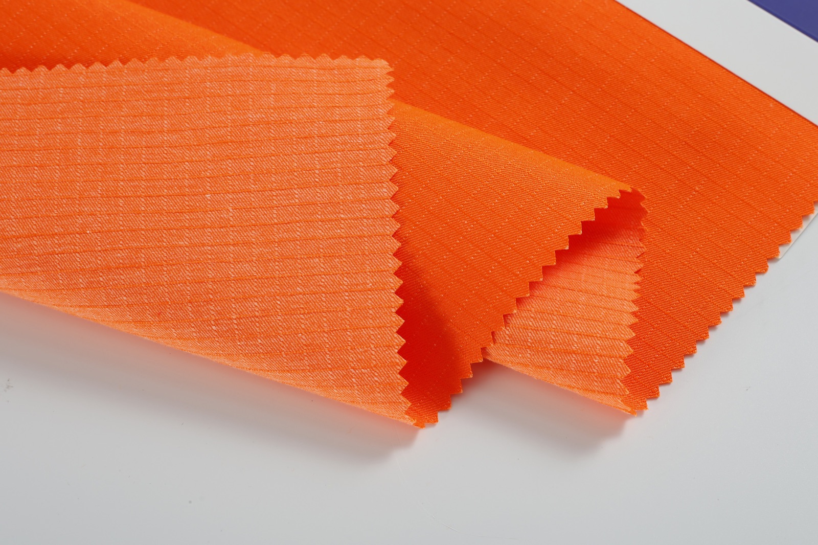 HM023 high-visibility orange TC ripstop fabric photograph