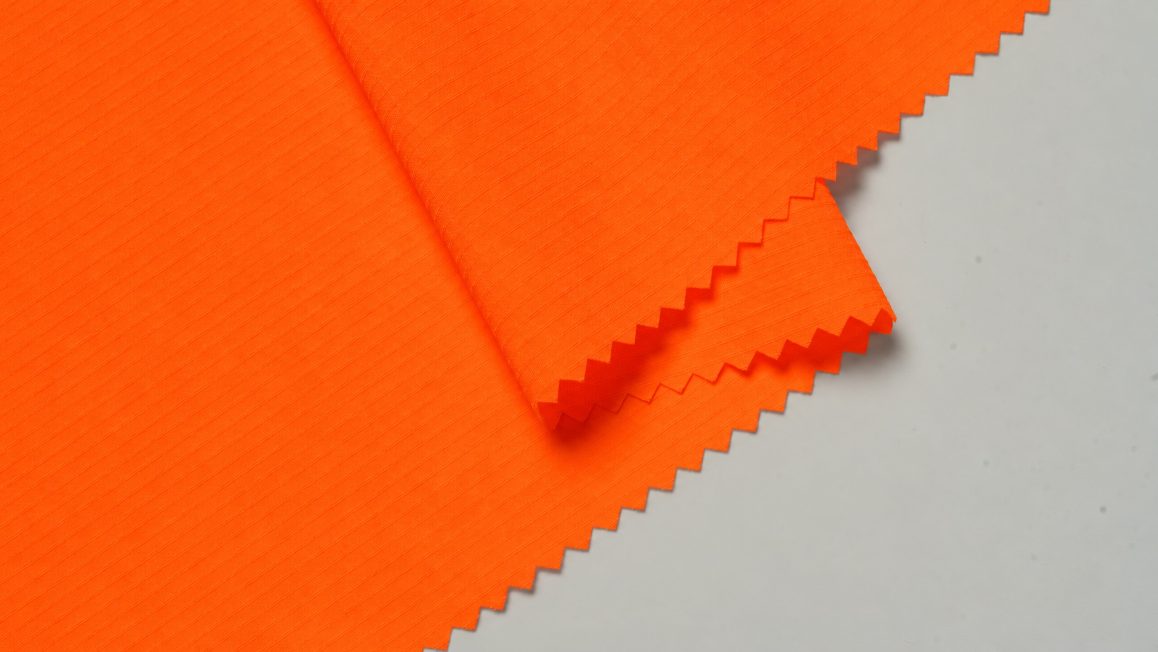 HM056 fluorescent orange custom-colour visualization, grid texture and folded detail