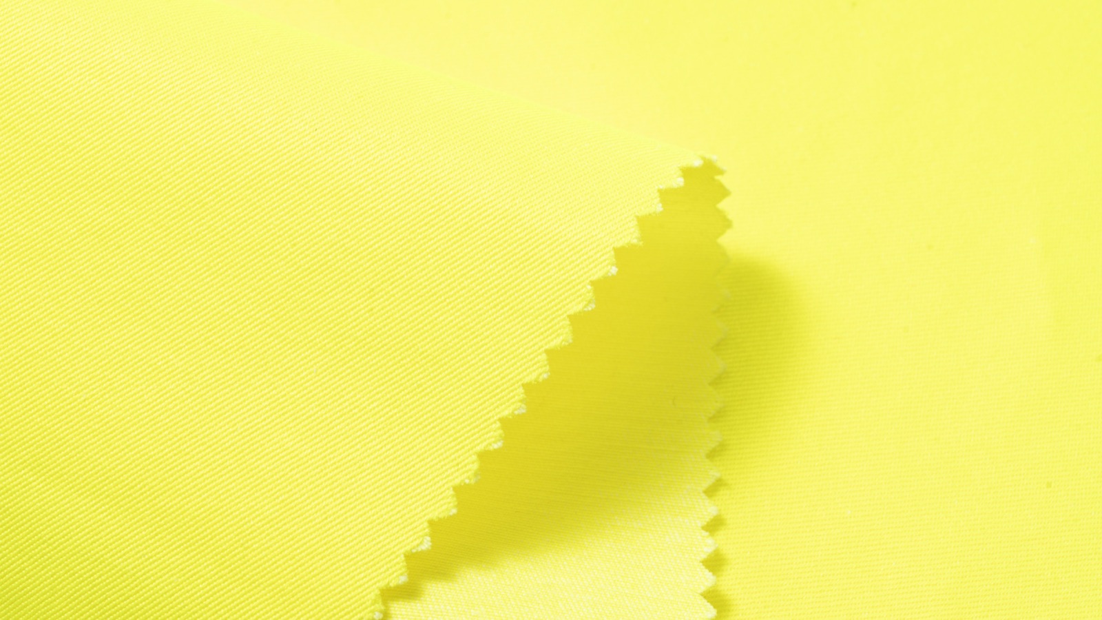HM095 high visibility yellow polyester cotton fabric detail view three